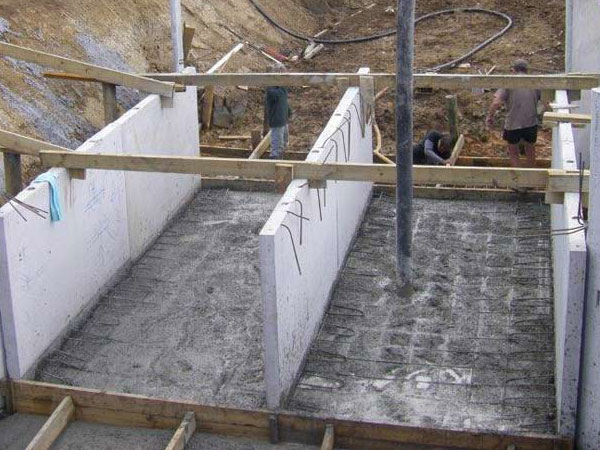 Custom concrete flood gate system for water and flood management
