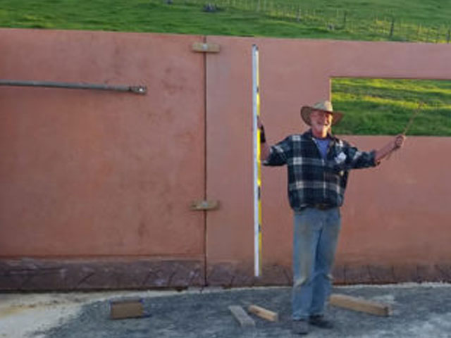 Precast concrete optic fibre tank being lifted into position